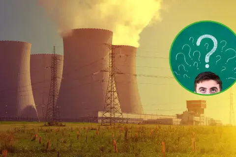 Lewica a transformacja energetyczna: czy poparcie dla elektrowni jądrowych jest odpowiedzią? W tle chłodnie kominowe.