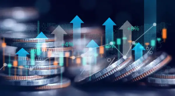 Wzrost finansowania samorządów terytorialnych: stosy monet, wykresy wzrostu i strzałki w górę ilustrują, jak Polska 2050 chce zwiększyć finansowanie samorządów terytorialnych.