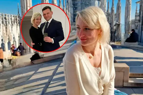 Sławomir Mentzen i jego żona na tle katedry.